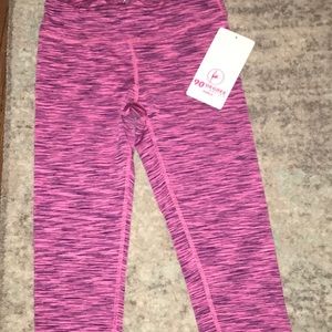 Never worn Refelx pink and black leggings